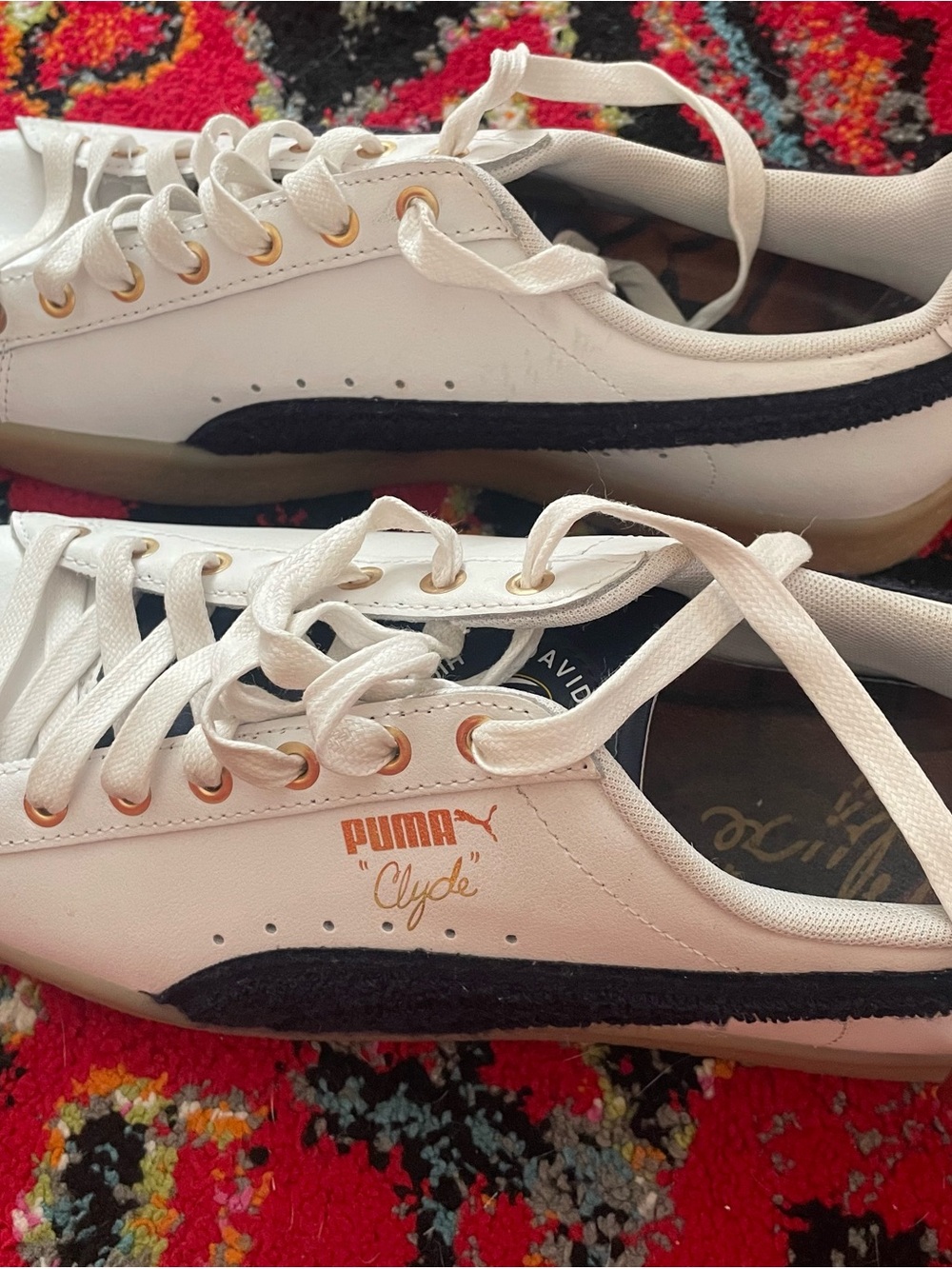 Puma Clyde Low-Top Sneakers in White with Black Formstrip